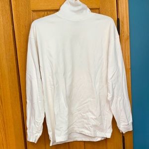 100% Cotton. White, Turtleneck.